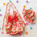 ชุดบอดี้สูทผูกหลังสำหรับลูกสาว – ดีไซน์น่ารักพร้อมหมวกฟรี